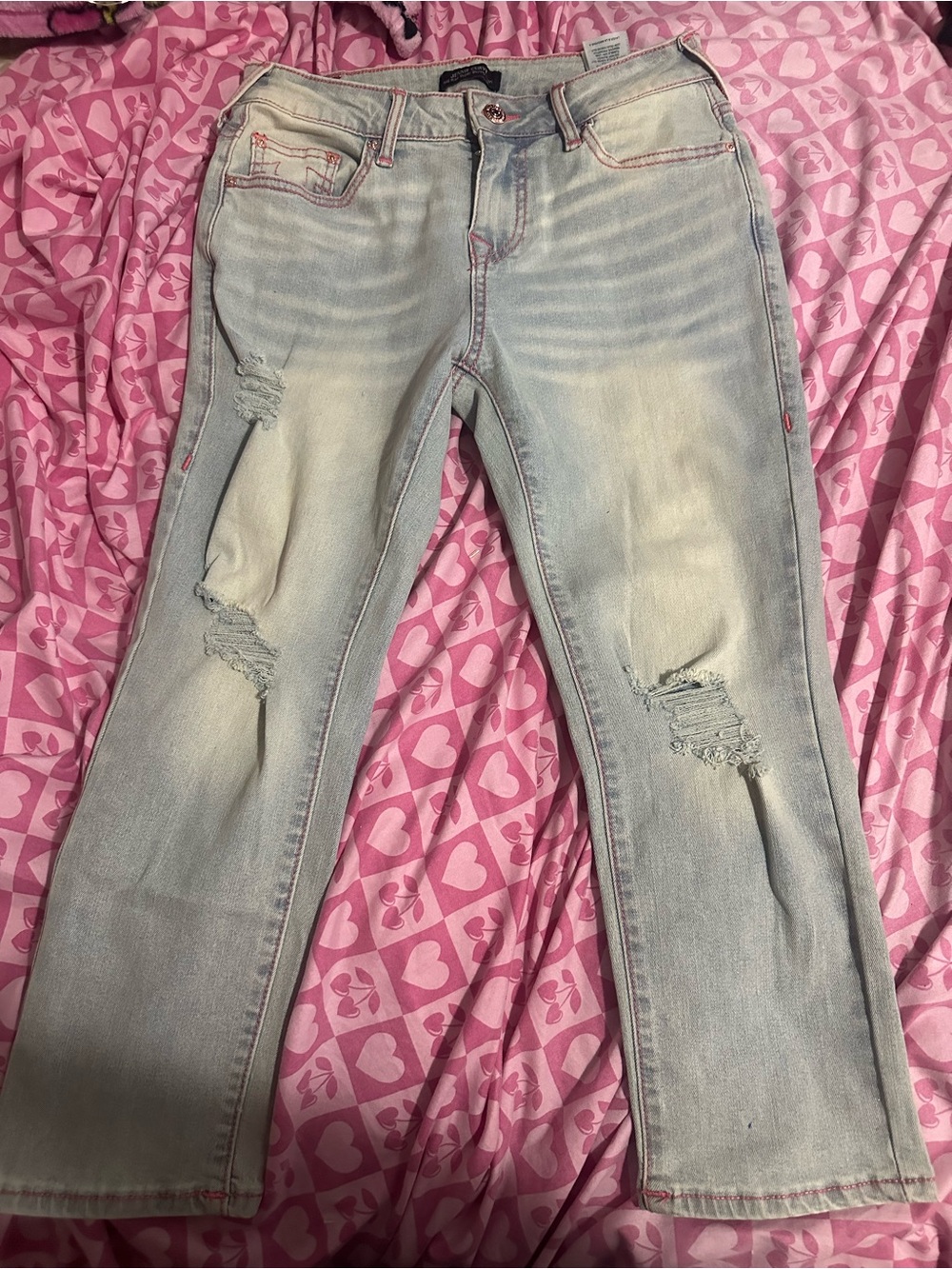 Light Wash Distressed Women’s Jeans - Brand Unspecified